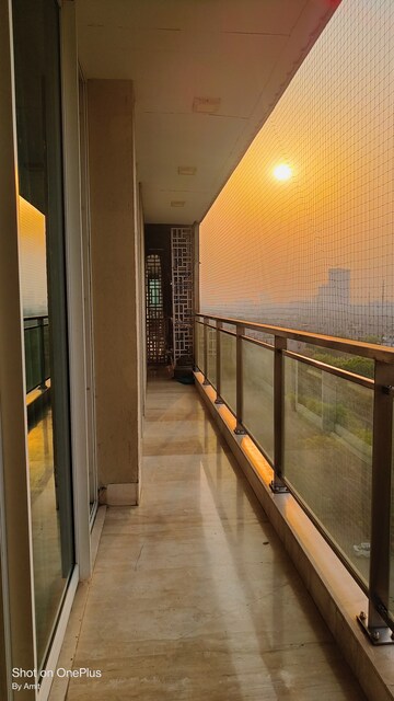 Balcony in 4 BHK Apartment at Ambience Tiverton, Sector 50 – for Rent