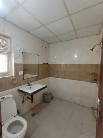 Bathroom in 3 BHK Apartment at Apex Athena, Sector 75 – for Rent