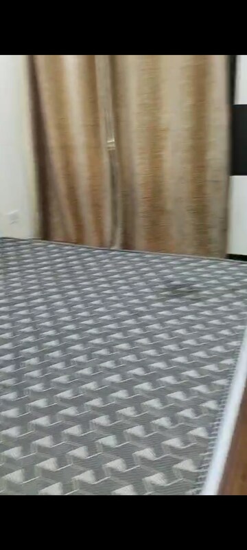 Bedroom in 2 BHK Apartment at Sikka Karnam Greens, Sector 143b – for Rent
