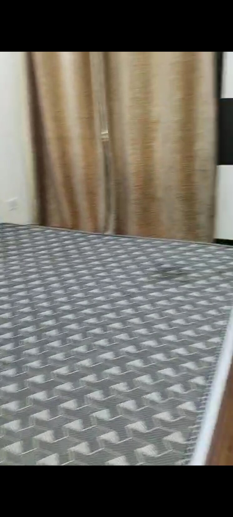 Bedroom, sikka-karnam-greens 2 Bedroom 940 Sq.Ft. Apartment In Sector 143b Noida 8935457