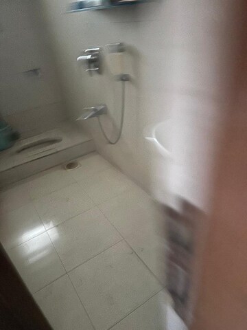 Bathroom in 4 BHK Apartment at Dadar West – for Sale