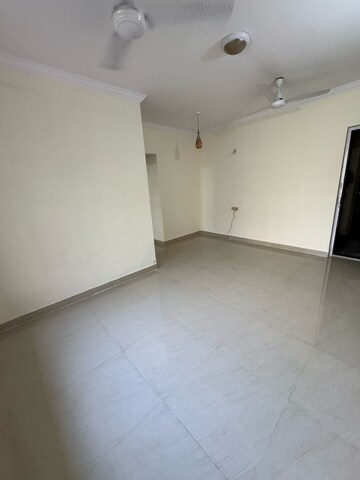 Room in 2 BHK Apartment at Dheeraj Godavari Apartment, Malad West – for Rent