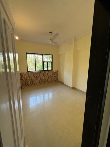 Bedroom in 2 BHK Apartment at Dheeraj Godavari Apartment, Malad West – for Rent
