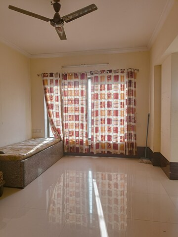 Living Room in 1 BHK Apartment at Royal Palms Garden View, Goregaon East – for Sale