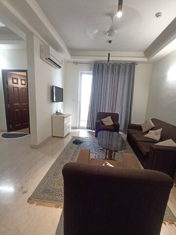 Living Room in 2 BHK Apartment at Wave Amore, Sector 32 – for Rent
