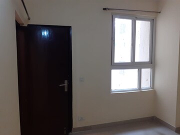 Room in 2 BHK Apartment at Galaxy North Avenue ll, Gaur City 2 – for Rent