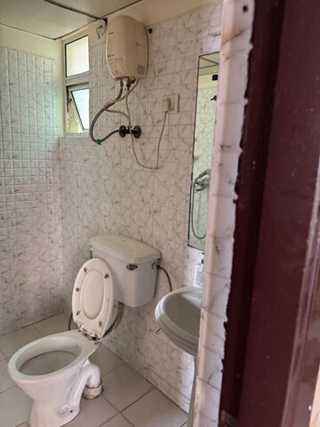 Bathroom in 2 BHK Apartment at Gaur City 2 - 12th Avenue, Sector 16c Greater Noida – for Rent