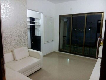 Living Room in 1 BHK Apartment at Unicorn Global Arena, Naigaon East – for Rent