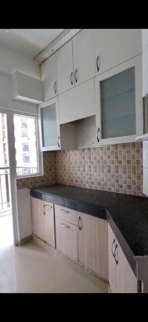 Kitchen in 2 BHK Apartment at Amaatra Homes, Sector 10 Greater Noida – for Sale