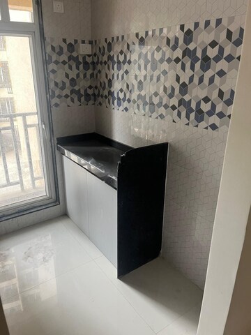 Kitchen in 1 BHK Apartment at Raunak Bliss, Ghodbunder Road – for Rent