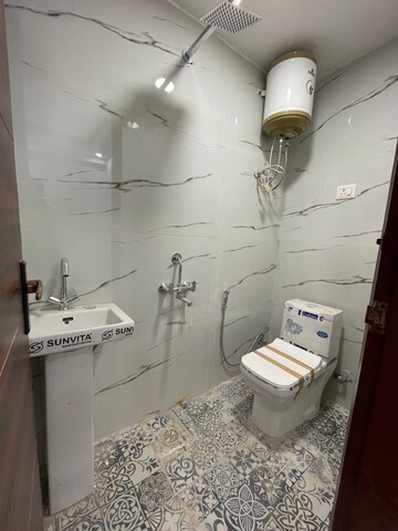 Bathroom in 2 BHK Builder Floor at Chattarpur – for Rent