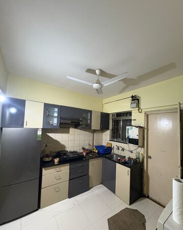 Kitchen in 2 BHK Apartment at Sonigara Omega Paradise, Wakad – for Rent