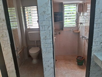 Bathroom in 1.5 BHK Apartment at Starwing Apurva Residencies, Andheri East – for Rent