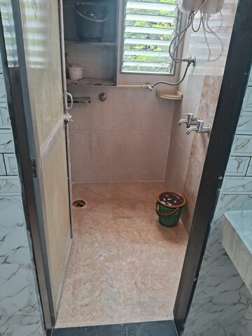 Bathroom in 1.5 BHK Apartment at Starwing Apurva Residencies, Andheri East – for Rent