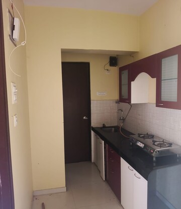 Kitchen in 1 BHK Apartment at Bhoomi Acres, Waghbil – for Rent