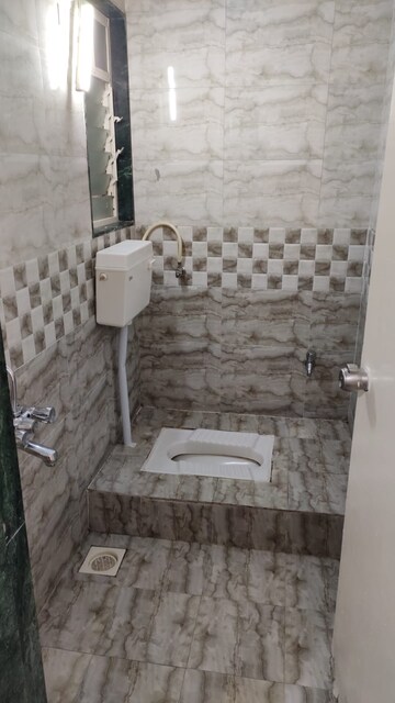 Bathroom in 3 BHK Apartment at Prabhat Road – for Sale