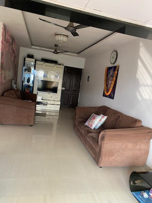 Living Room in 2 BHK Apartment at Regency Estate, Dombivli East – for Sale