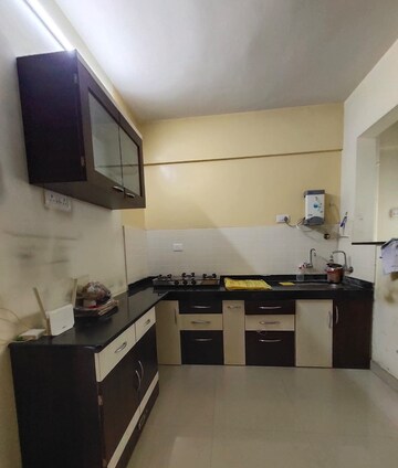 Kitchen in 2 BHK Apartment at Aishwaryam Greens Co-operative Housing Society, Wakad – for Rent