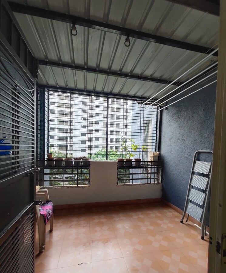 Balcony, aishwaryam-greens-co-operative-housing-society 2 Bedroom 850 Sq.Ft. Apartment In Wakad Pune 8936342