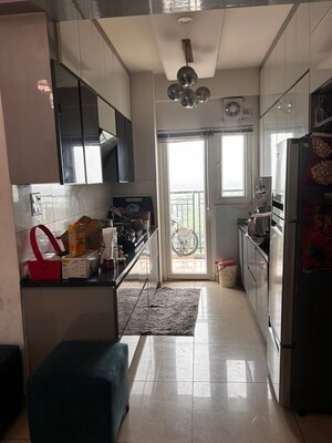 Kitchen in 2.5 BHK Apartment at Gulshan Botnia, Sector 144 – for Sale