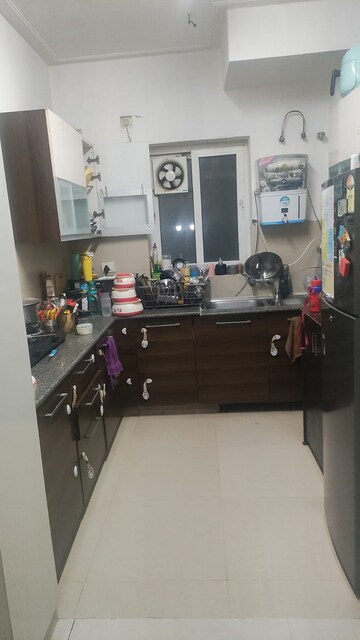 Kitchen in 3 BHK Apartment at Purvanchal Royal Park, Sector 137 – for Sale