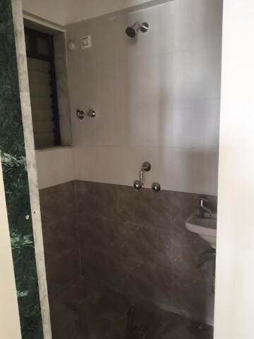 Bathroom in 1 BHK Apartment at Vile Parle East – for Rent