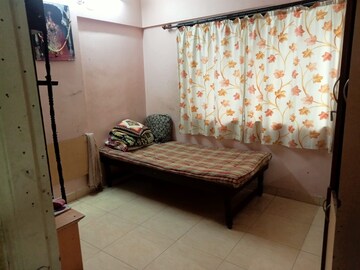Bedroom in 1 BHK Apartment at Sarla Niwas, Model Colony – for Rent