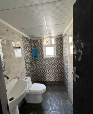 Bathroom in 2.5 BHK Apartment at Amrapali Silicon City, Sector 76 – for Sale