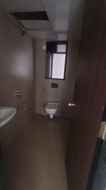 Bathroom in 2 BHK Apartment at Runwal Eirene, Balkum Pada – for Rent