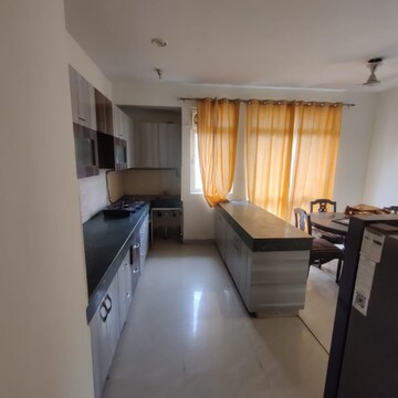 Kitchen in 4 BHK Apartment at Jaypee Greens Wish Town Klassic, Sector 134 – for Rent