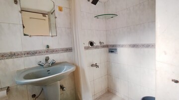 Bathroom in 1 BHK Apartment at Bandra West – for Rent
