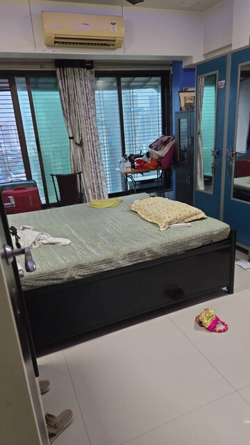 Bedroom in 2 BHK Apartment at Mahim Landmark, Mahim – for Rent