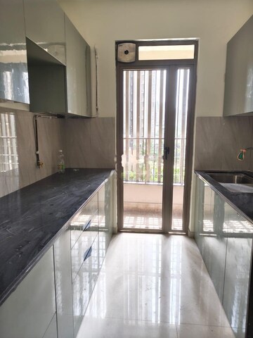 Kitchen in 2 BHK Apartment at Kalpataru Paramount, Kapur Bawdi – for Rent