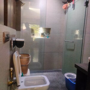 Bathroom in 2 BHK Apartment at Oshiwara Mhada, Andheri West – for Sale
