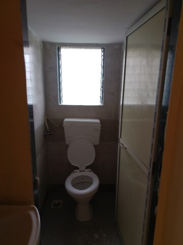 Bathroom in 1 BHK Apartment at Sahaj Mitra Chs, Kalwa – for Rent
