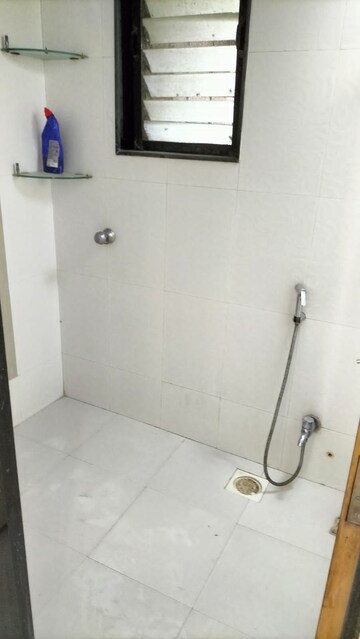 Bathroom in 1 BHK Apartment at Arpan Darpan CHS, Goregaon East – for Rent