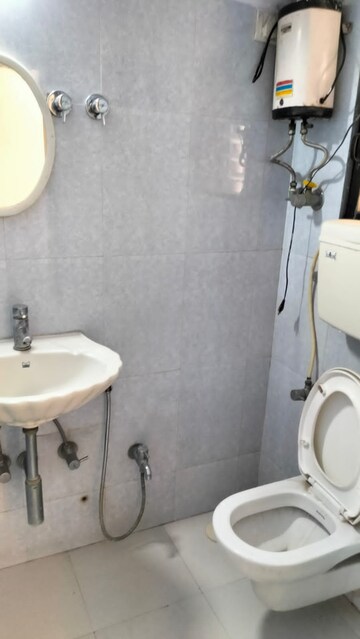 Bathroom in 1 BHK Apartment at Arpan Darpan CHS, Goregaon East – for Rent