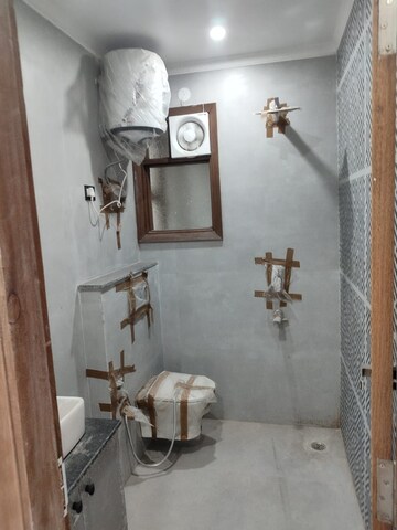 Bathroom in 3 BHK Builder Floor at Freedom Fighters Enclave – for Rent