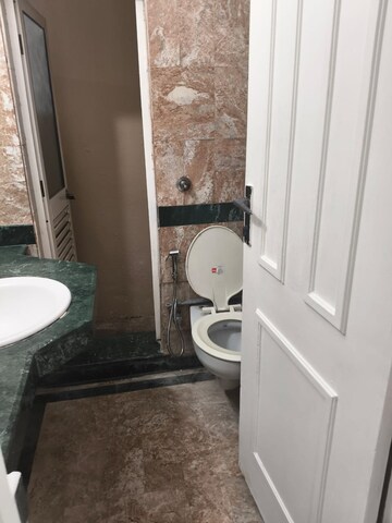 Bathroom in 2 BHK Apartment at Hiranandani Gardens Glen Height, Powai – for Rent