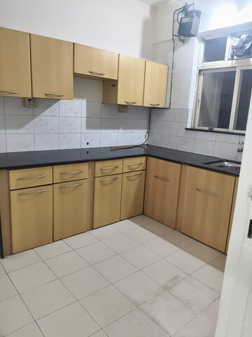 Kitchen in 2 BHK Apartment at Hiranandani Gardens Glen Height, Powai – for Rent