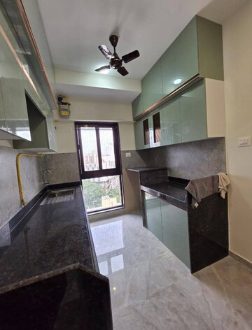 Kitchen in 1 BHK Apartment at Ajmera Boulevard, Malad West – for Rent