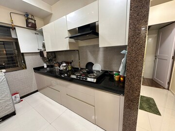 Kitchen in 3 BHK Apartment at Acme Ozone, Manpada – for Rent