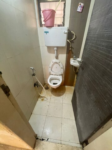 Bathroom in 2 BHK Apartment at Ravi Group Gaurav woods 2, Mira Road – for Sale