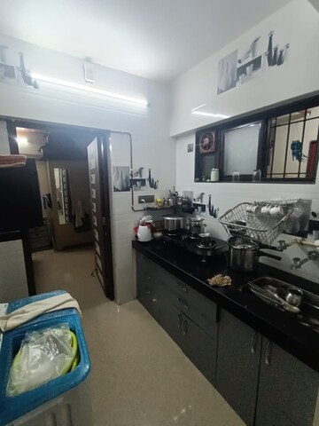Kitchen in 1 BHK Apartment at Khaparidev CHS, Parel – for Sale
