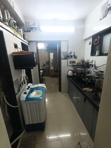 Kitchen in 1 BHK Apartment at Khaparidev CHS, Parel – for Sale