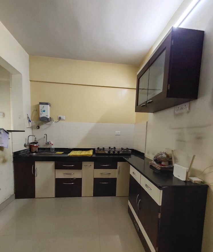 Kitchen, aishwaryam-greens-co-operative-housing-society 2 Bedroom 950 Sq.Ft. Apartment In Wakad Pune 8937700
