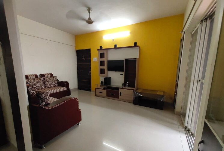 Living Room, aishwaryam-greens-co-operative-housing-society 2 Bedroom 950 Sq.Ft. Apartment In Wakad Pune 8937700
