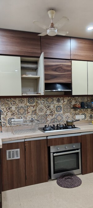 Kitchen in 2 BHK Apartment at Oshiwara Mhada, Andheri West – for Sale