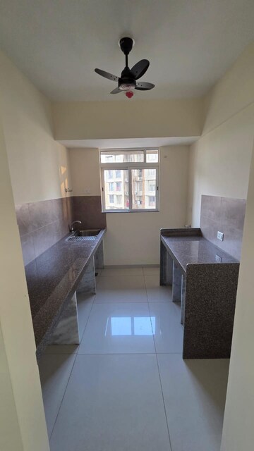 Kitchen in 1 BHK Apartment at Godrej Nest Kandivali, Kandivali East – for Rent
