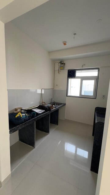 Kitchen in 1 BHK Apartment at Ashar Axis, Majiwada – for Rent